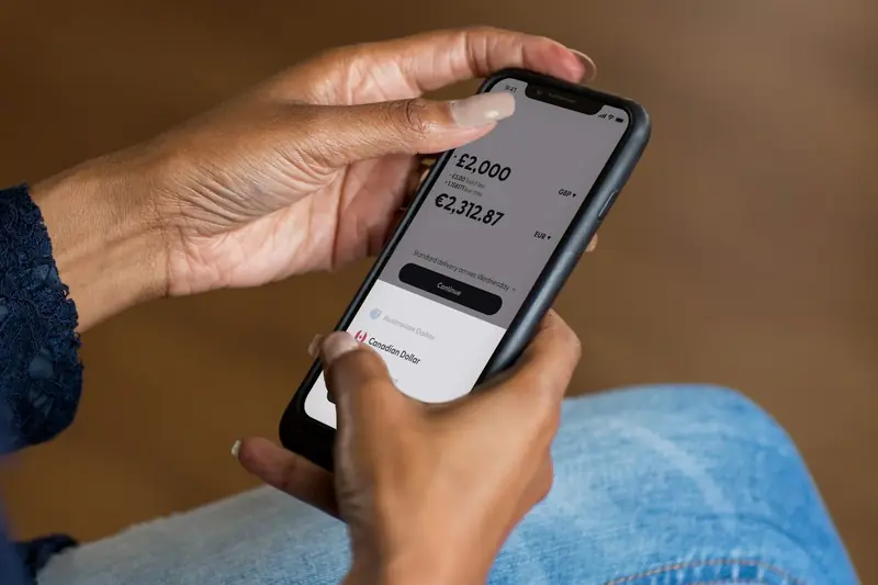 A person checking a payment on a mobile app